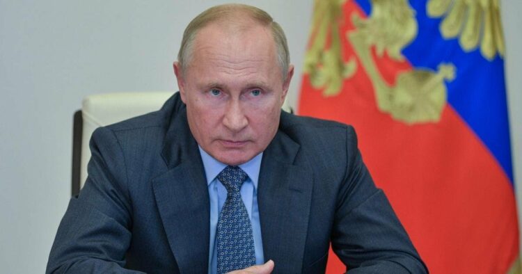 Putin signs law that could keep him in power until 2036
